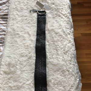 Brand new, tags still attached, belt